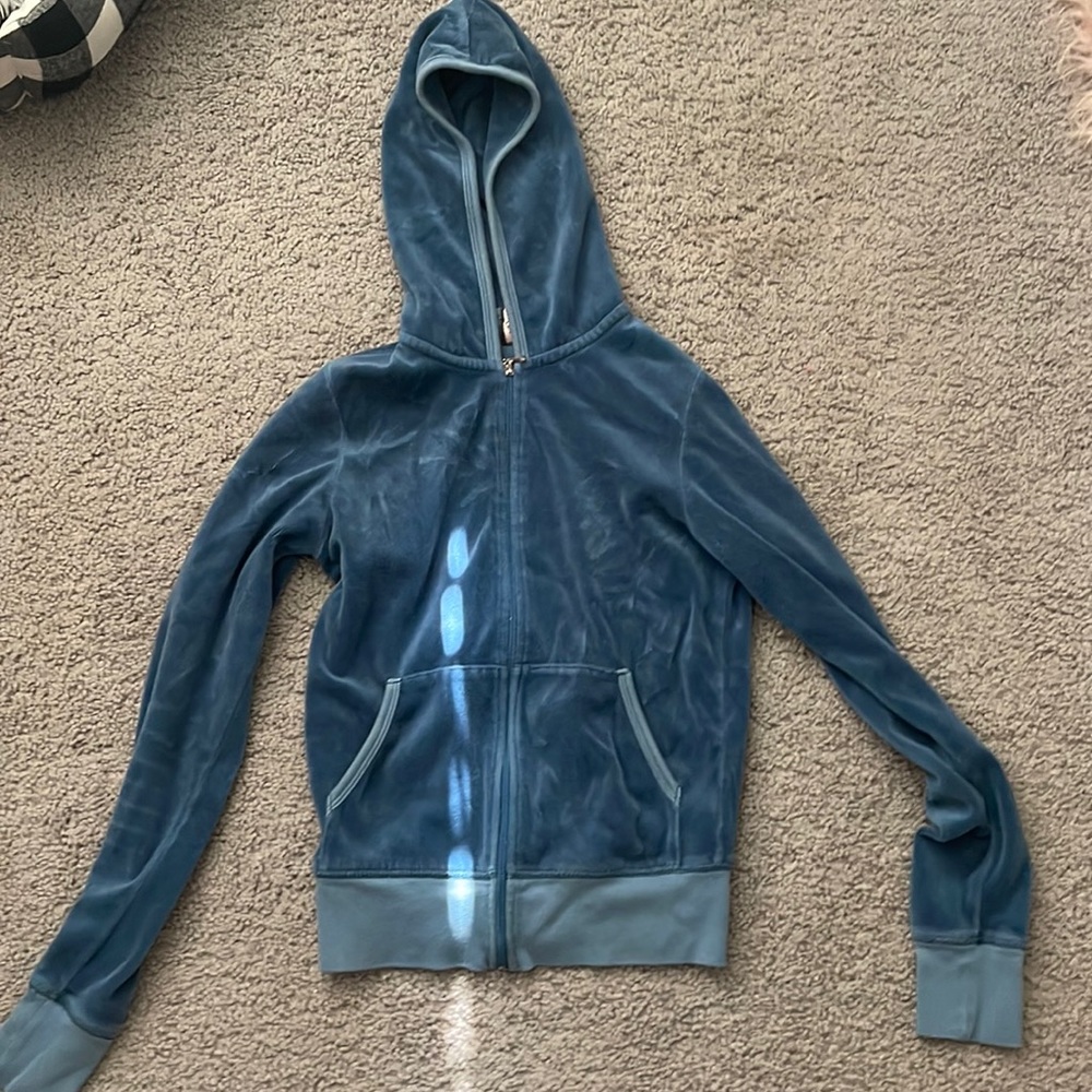 Zip up jacket, blue, size I would say XS/S faded back